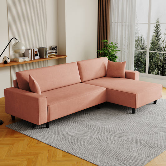 The 93-inch orange corduroy sofa bed comes with two pillows to fit in the living room and the apartment is not overcrowded